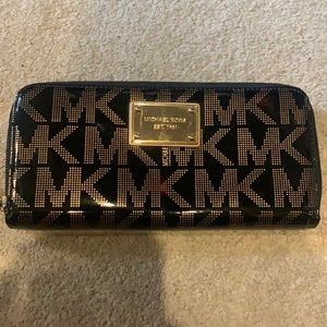 Micheal Kors Black and Gold Logo Wallet